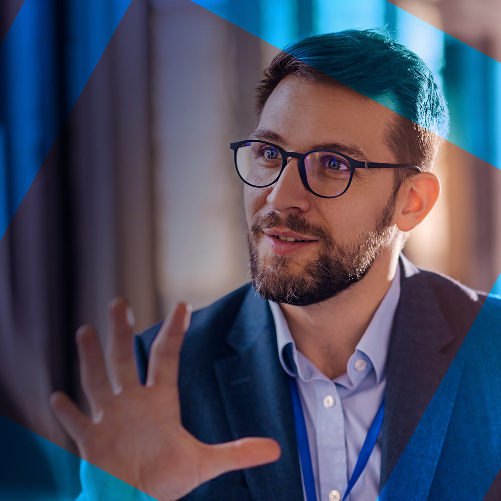 Altrin Systems Consultant speaking with blue decorative line across the image